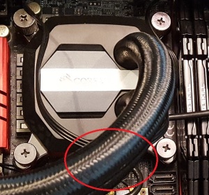 Cooling head with USB connector show (obscured by hose)